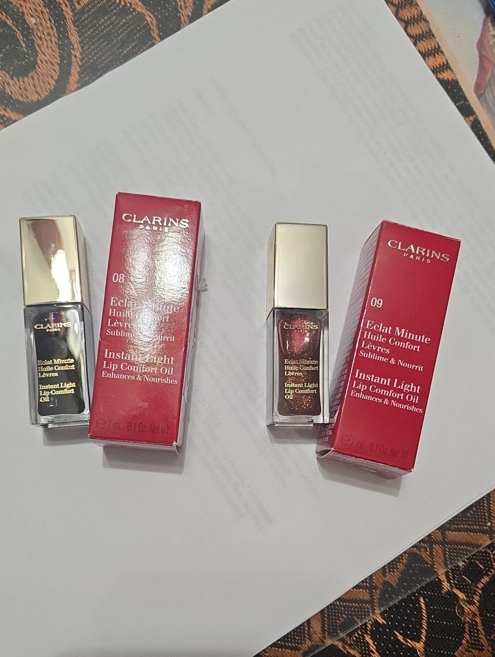 Clarins Instant Light Lip Comfort Oil Duo — Deep Red & Warm Brown